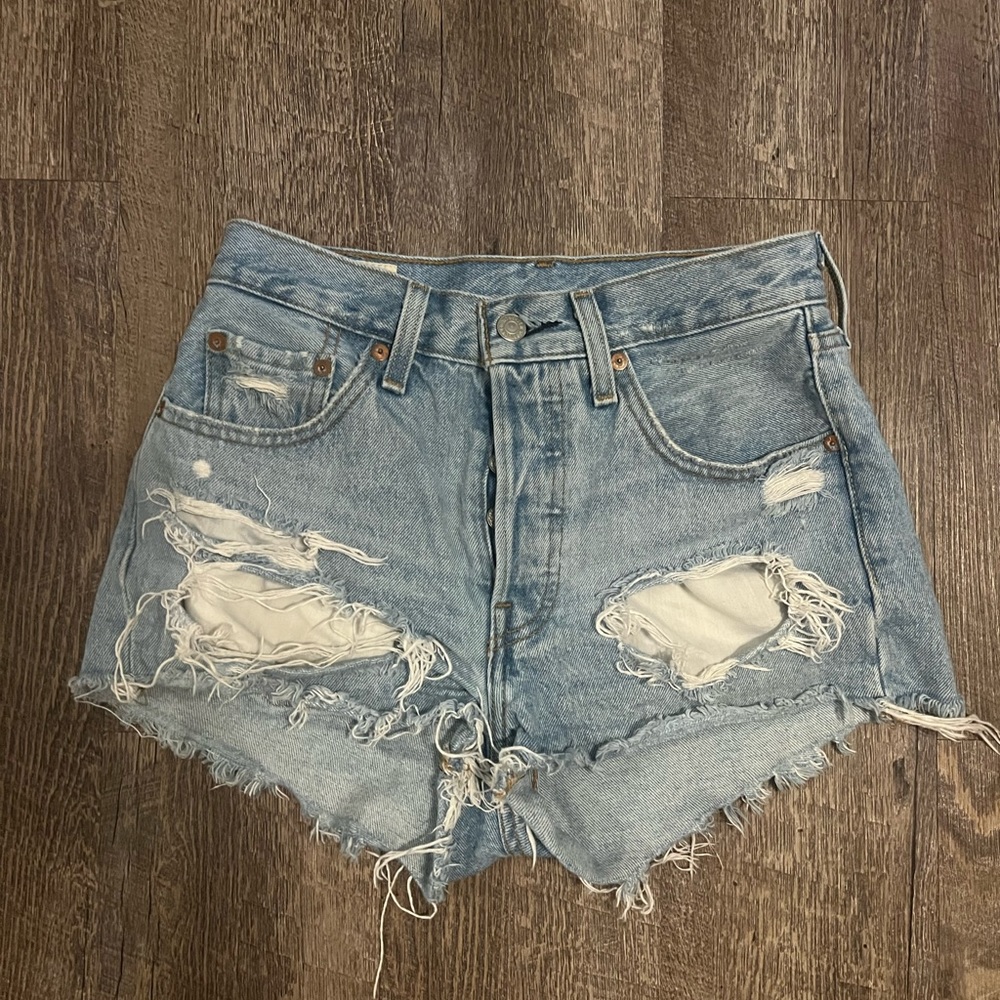 Ripped Levi light wash denim shorts